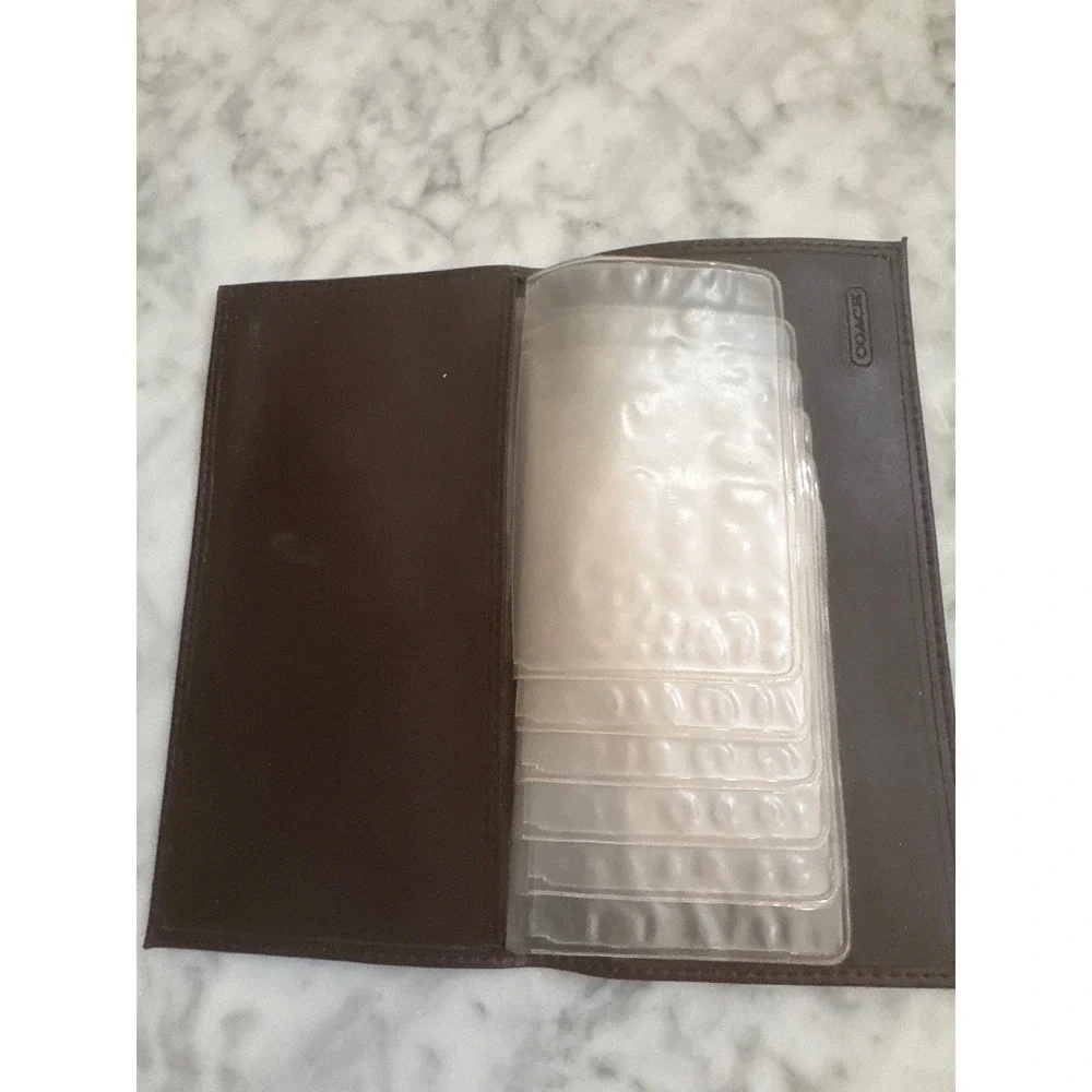 Coach checkbook cover